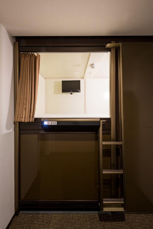 Capsule Hotel Cube Hiroshima Extérieur photo