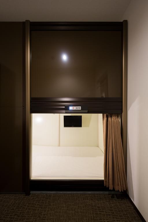 Capsule Hotel Cube Hiroshima Extérieur photo