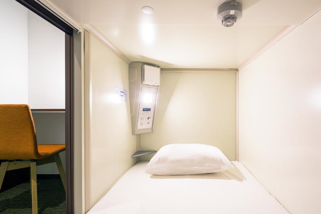 Capsule Hotel Cube Hiroshima Extérieur photo