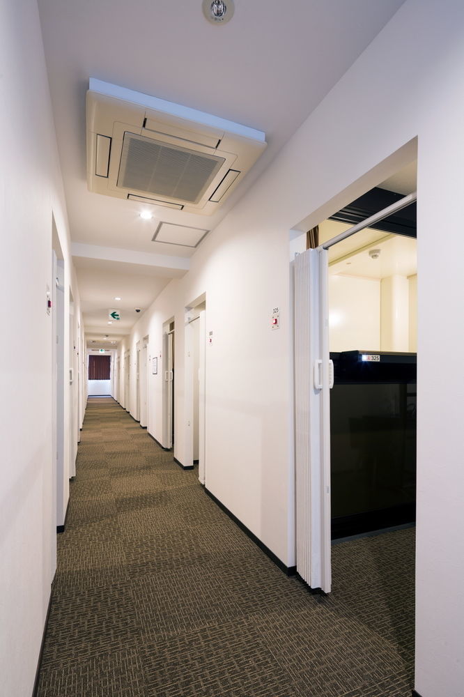 Capsule Hotel Cube Hiroshima Extérieur photo